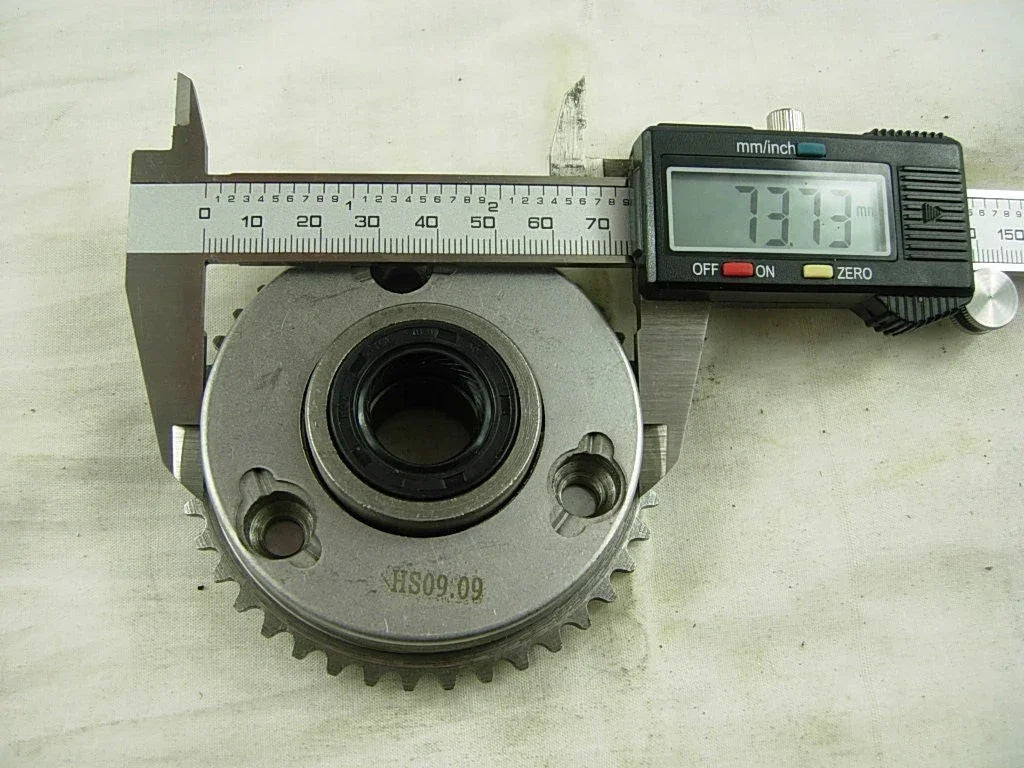 Overrun starter drive clutch assembly for 50-125cc dirt bike engines, compatible with various off-road motorcycle models.