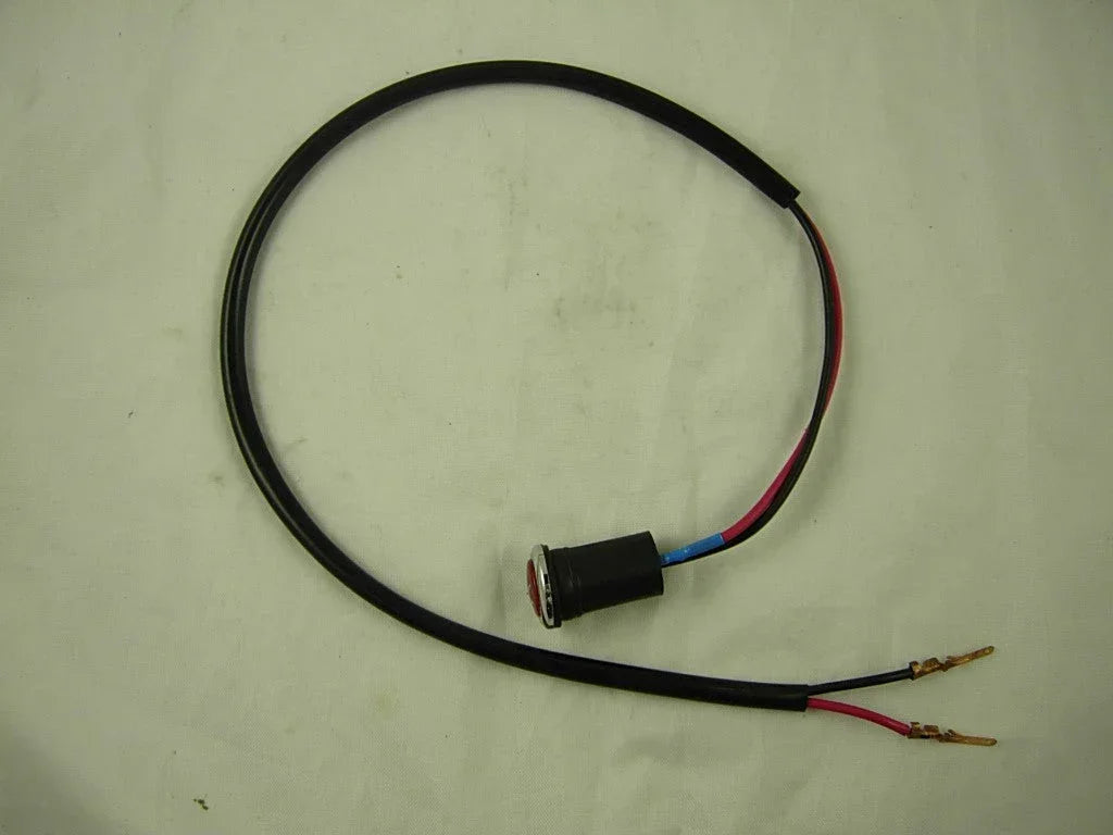 Reverse indicator light for 150cc dirt bike, black plastic housing, clear lens, compatible with various 150cc dirt bike models.