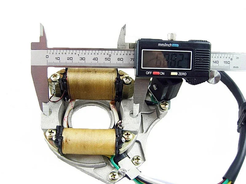 Stator E22 for 50cc, 70cc, 90cc, 110cc dirt bike engines, shown in this image of dirt bike parts.