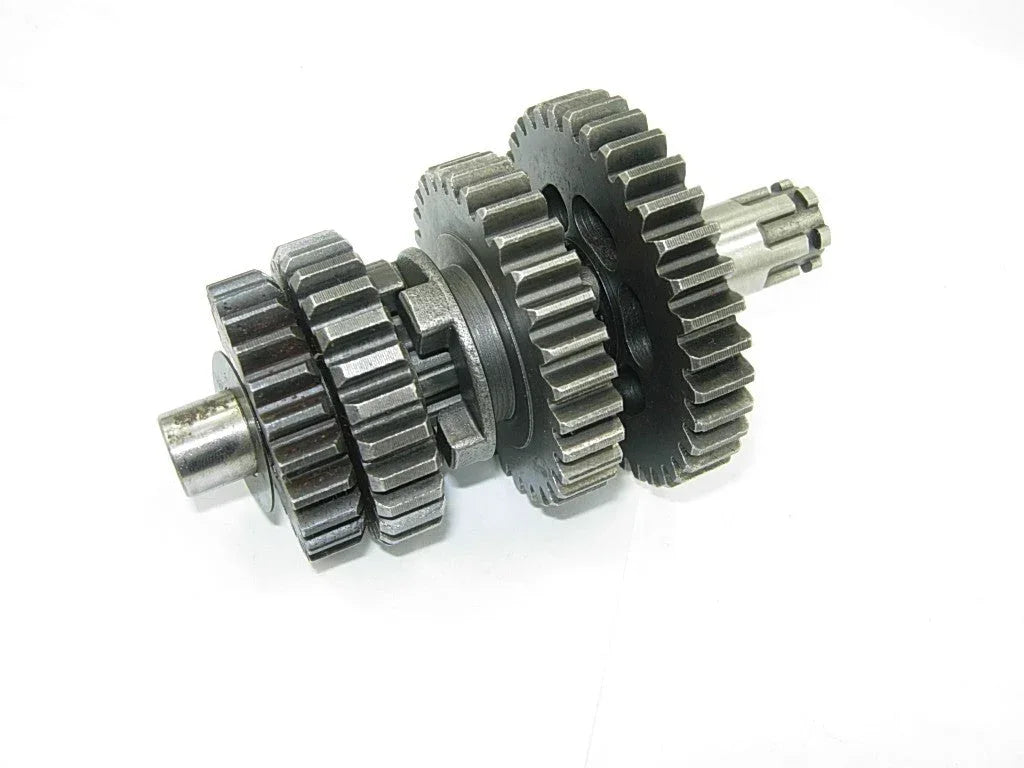 Dirt bike transmission main and counter shaft with gears for 50cc-125cc bikes, includes metal shafts and gear components.