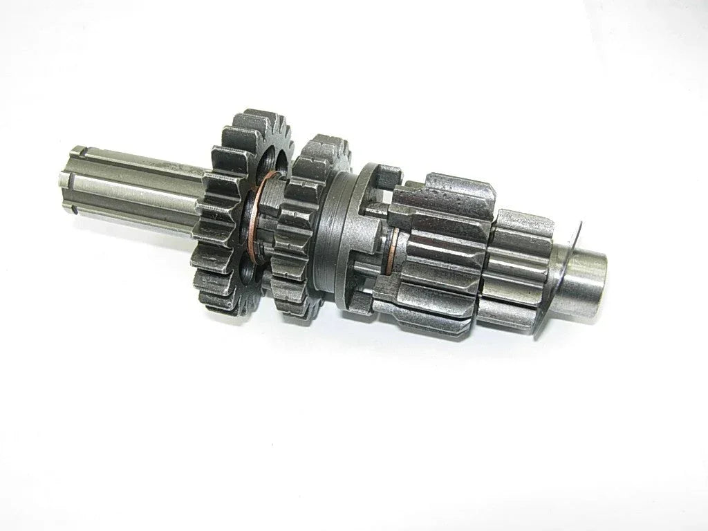 Dirt bike transmission main and counter shaft with gears for 50cc-125cc models, compatible with various dirt bike brands.