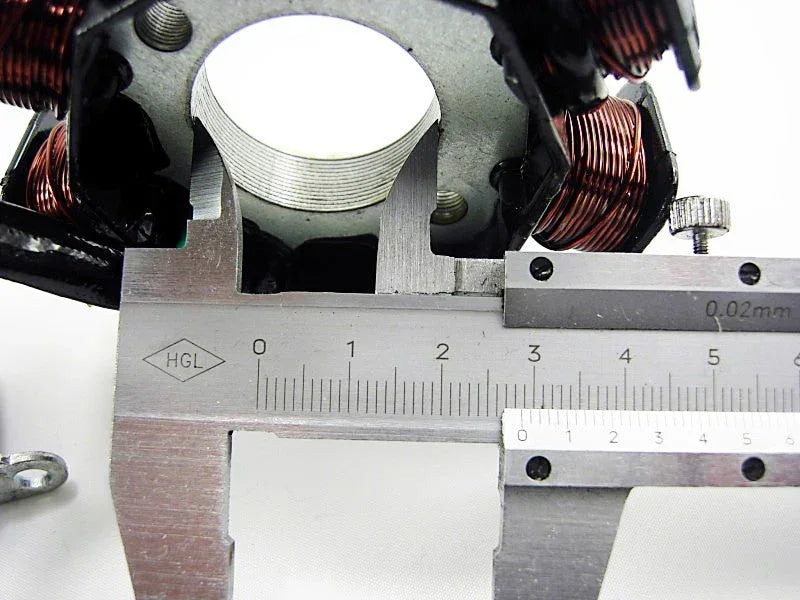 6-coil magneto stator coil for 50cc to 125cc GY6 scooters, shown with metal coils and wiring for engine ignition system