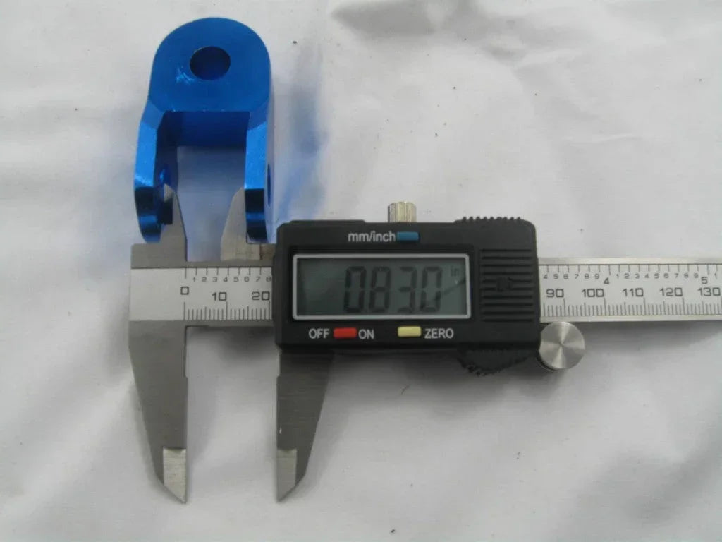 Absorber heighten connection for GY6 50cc and 150cc scooters, part from vendor-unknown, shown in close-up image.