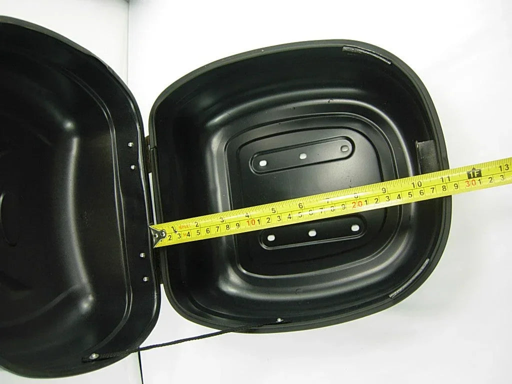 Storage trunk for 50cc, 125cc, 150cc GY6 scooters, black plastic with secure latch and spacious interior for parts and accessories.