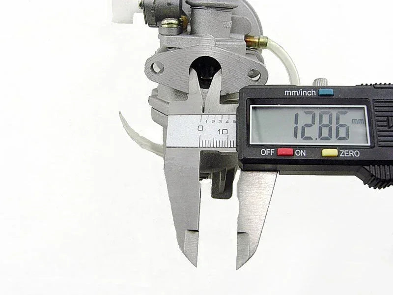 47cc pocket bike carburetor measured with digital caliper displaying 12.86 mm