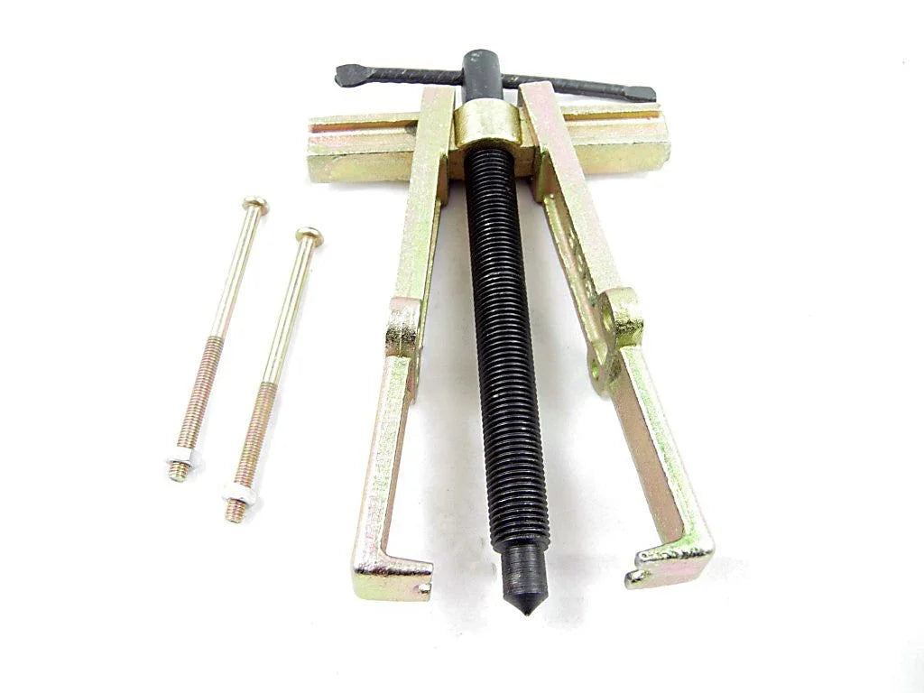 Two-jaw gear puller tool with black central screw and two long silver bolts on white background