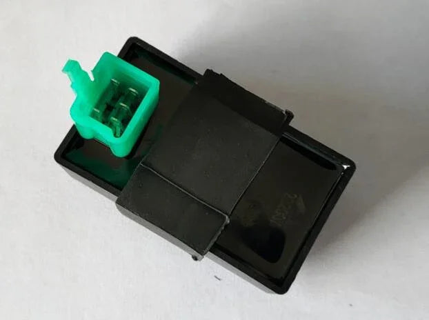 black 5-pin CDI ignition box with green connector for 50cc to 125cc motorcycles on white background
