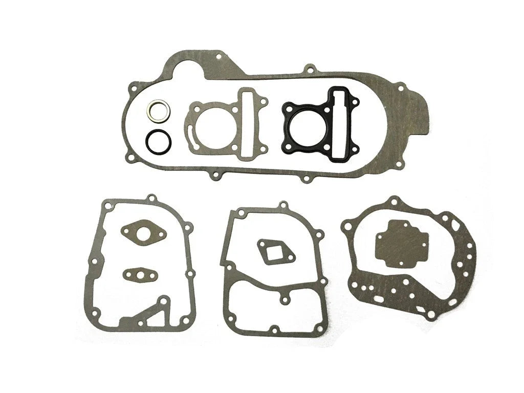 Set of metal engine gaskets and seals for automotive or motorcycle engine repair