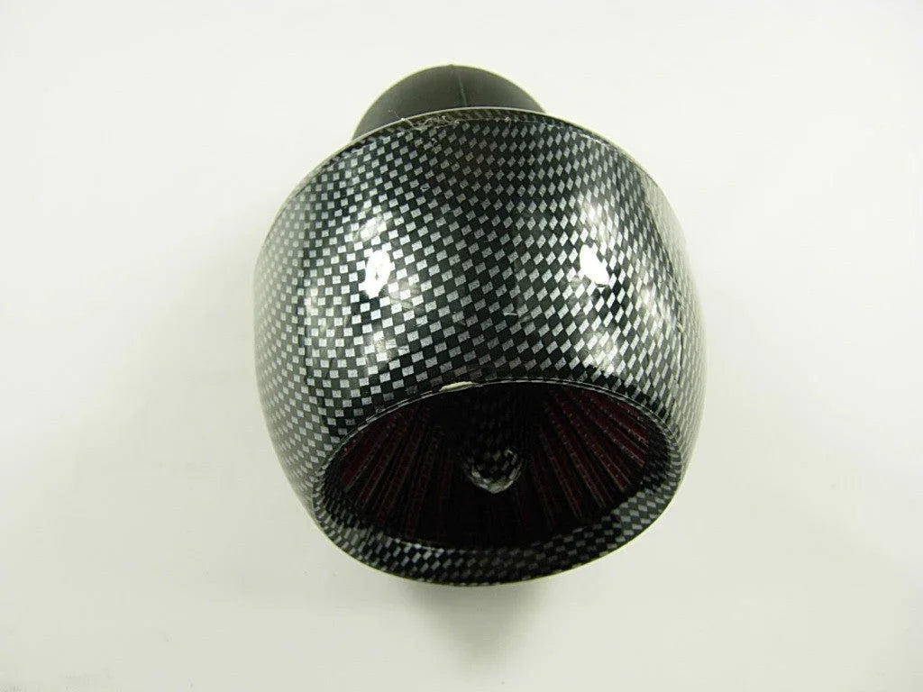 Close-up of a black carbon fiber air intake filter with a checkered pattern and red inner filter
