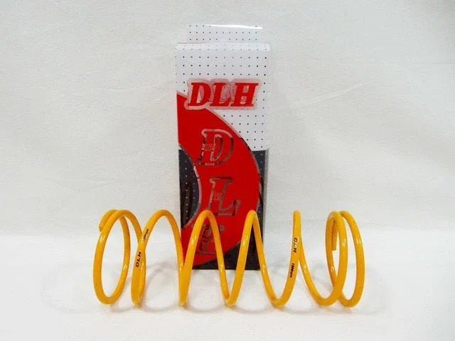 Yellow DLH suspension spring for 150cc motorcycles displayed in front of branded DLH packaging box