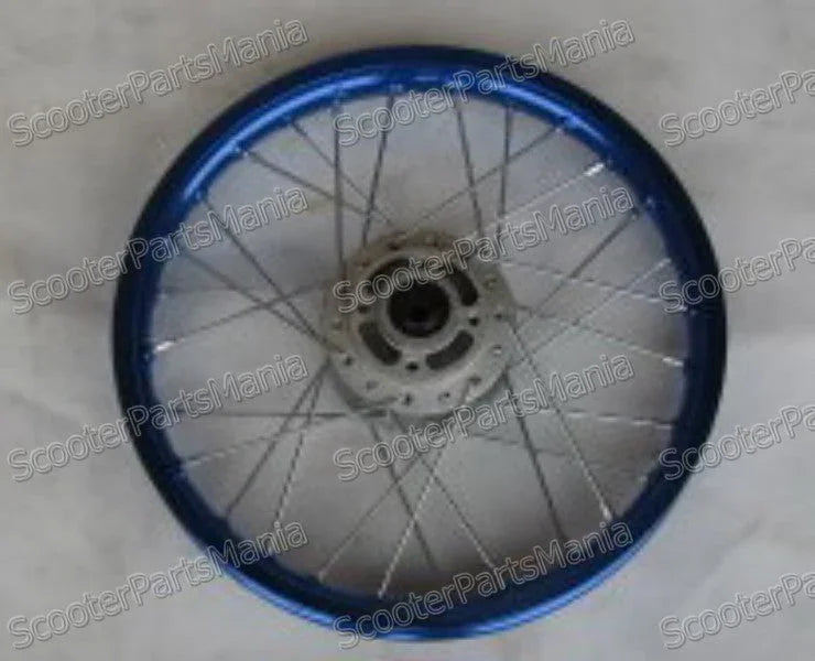 Blue metal spoked wheel rim with central hub for scooter or bicycle on light background