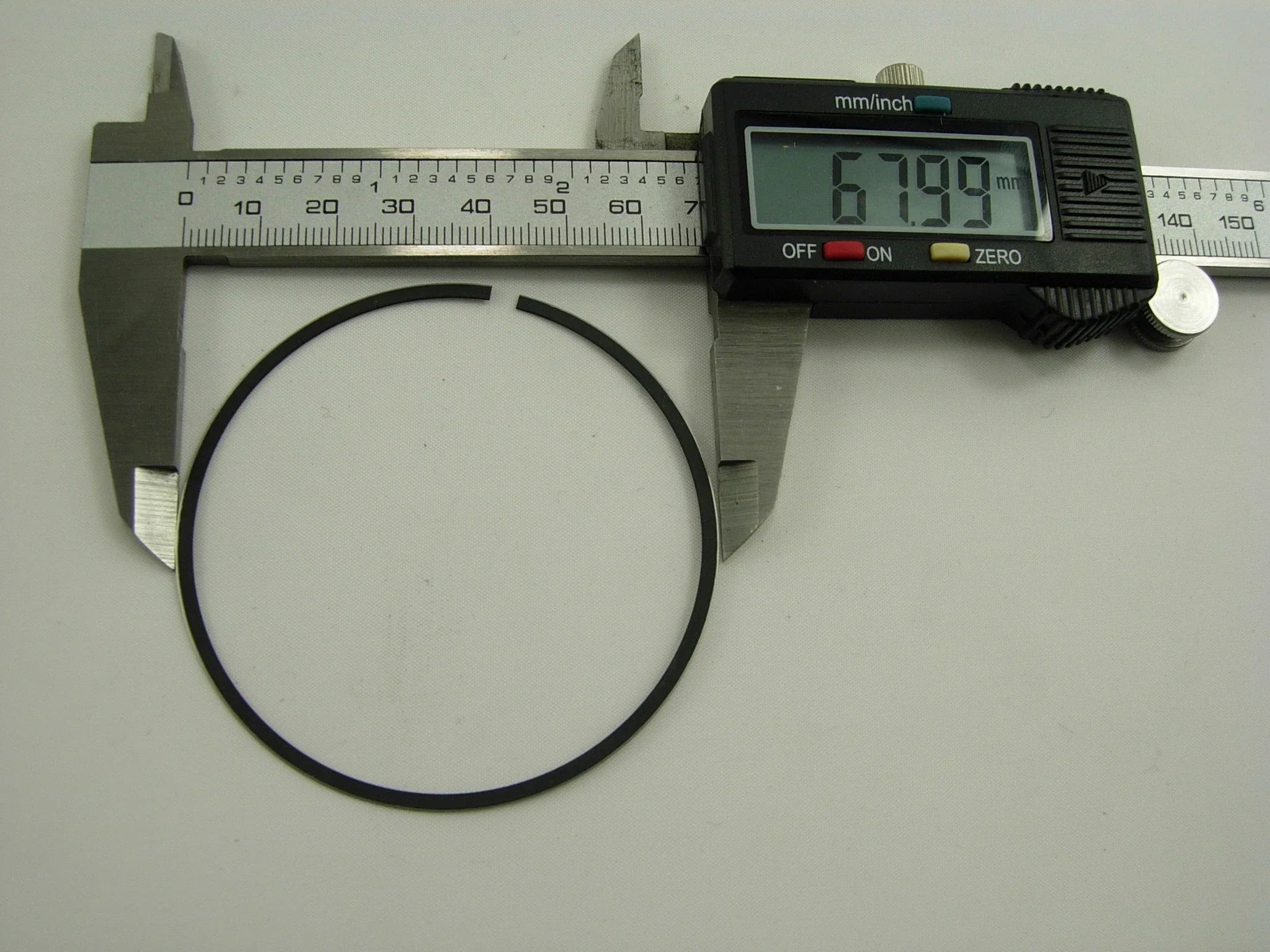 250cc CG engine piston ring set for dirt bikes from ChinesePartsUSA, showing close-up of the piston rings and engine components.