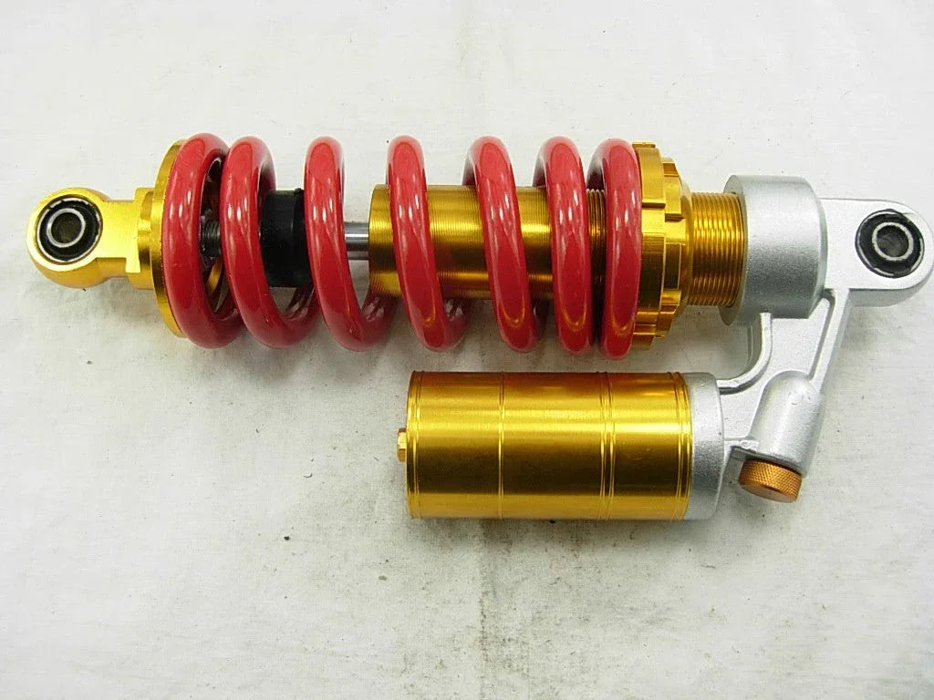 26cm rear gas absorber for dirt bikes, ChinesePartsUSA brand, shown in close-up with mounting components and shock absorber details.