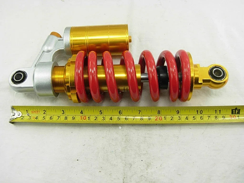 26cm rear gas absorber for dirt bikes by ChinesePartsUSA, durable shock absorber part for improved suspension performance.