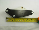 Alloy dirt bike chain guide part with three bolts, measured by tape on white background