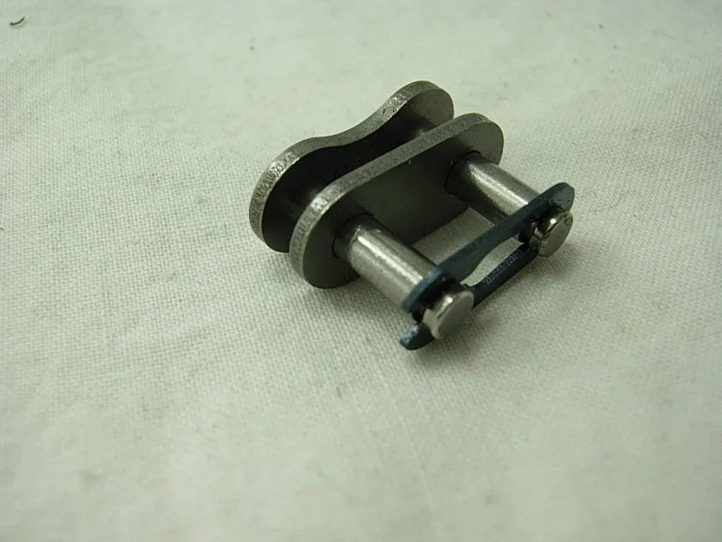ChinesePartsUSA 420 master chain link for dirt bike, showing metal chain link component with detailed design.