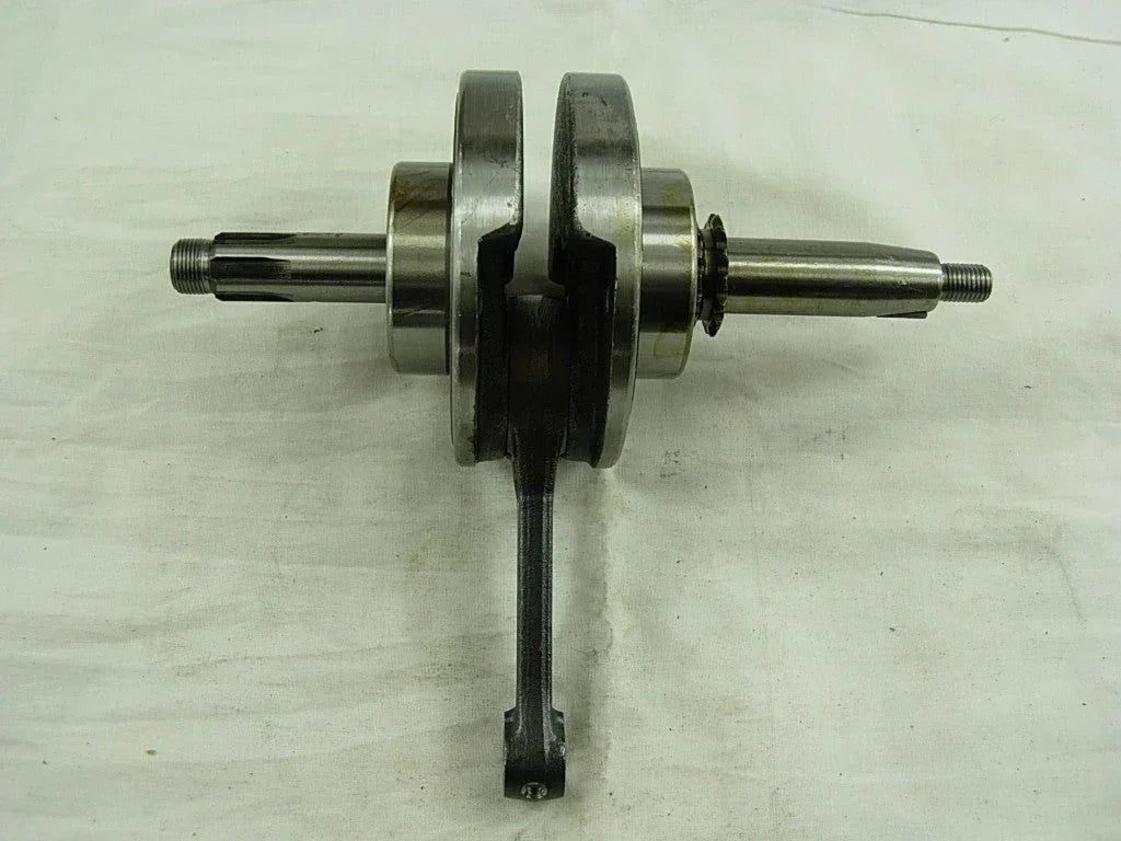 ChinesePartsUSA 50cc-110cc dirt bike and ATV engine crankshaft, durable replacement part for off-road motorcycle engines.