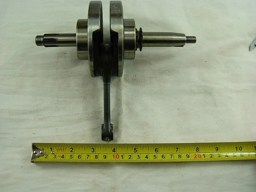 ChinesePartsUSA 50cc-110cc dirt bike and ATV engine crankshaft, durable metal part for dirt bike maintenance and repair.