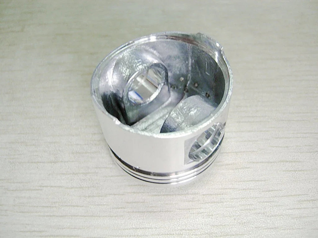 50cc engine piston set for dirt bikes, horizontal style, compatible with ChinesePartsUSA 50cc dirt bike parts.