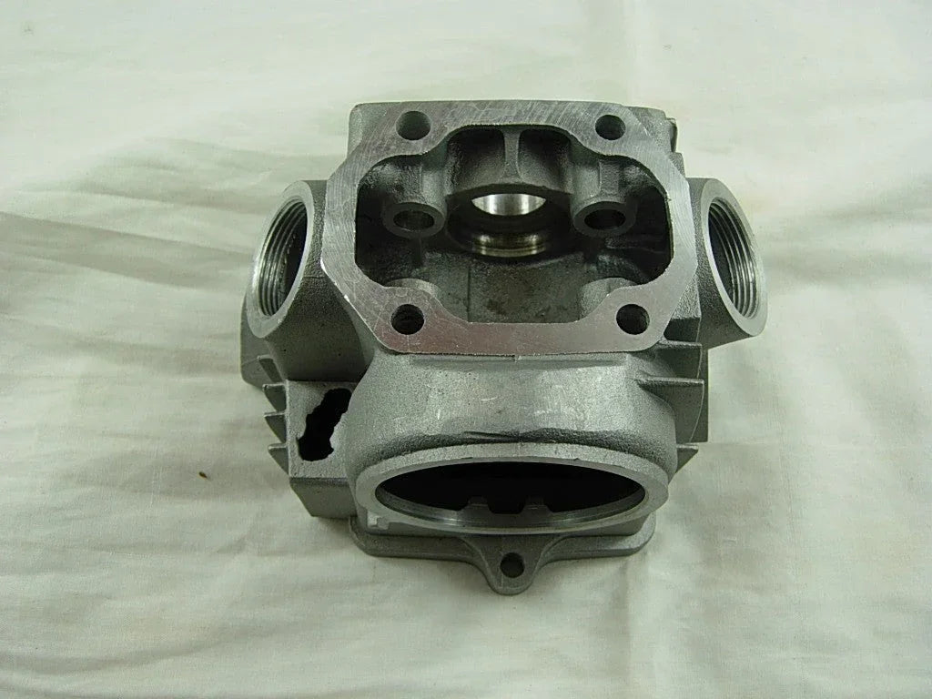 ChinesePartsUSA 70cc/90cc E22 style dirt bike engine cylinder head with cooling fins and valve openings.