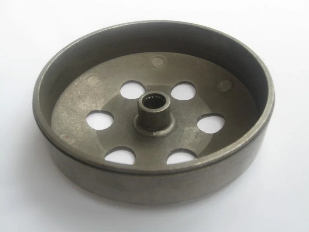 Metal flywheel with six round holes and central splined hub on white background