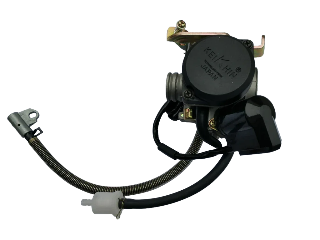 Keihin carburetor with black cover and connected fuel and throttle cables for motorcycle engine