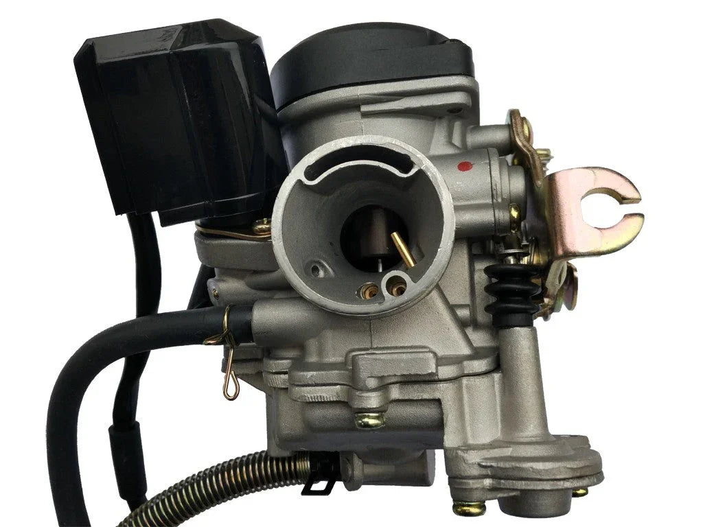 Close-up of a silver motorcycle carburetor with black plastic cover and attached hoses
