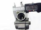 PZ20 carburetor for 110cc ATV or dirt bike measured with digital caliper, close-up view