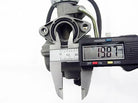 Digital caliper measuring 19.87mm opening on a 110cc PZ20 carburetor with metal choke