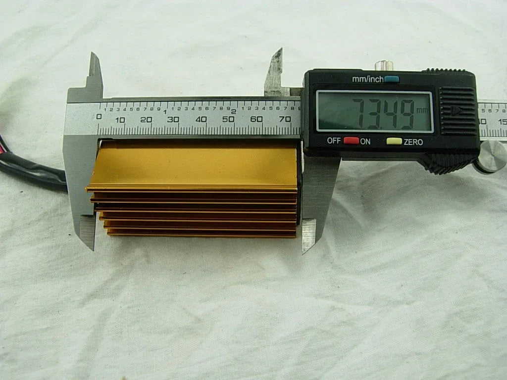 Gold performance CDI for 50cc 2-stroke scooter measured with digital caliper at 73.49mm