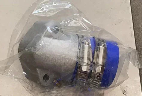 Blue and silver motorcycle carburetor in plastic wrap, compatible with dirt bikes, ATVs, and scooters
