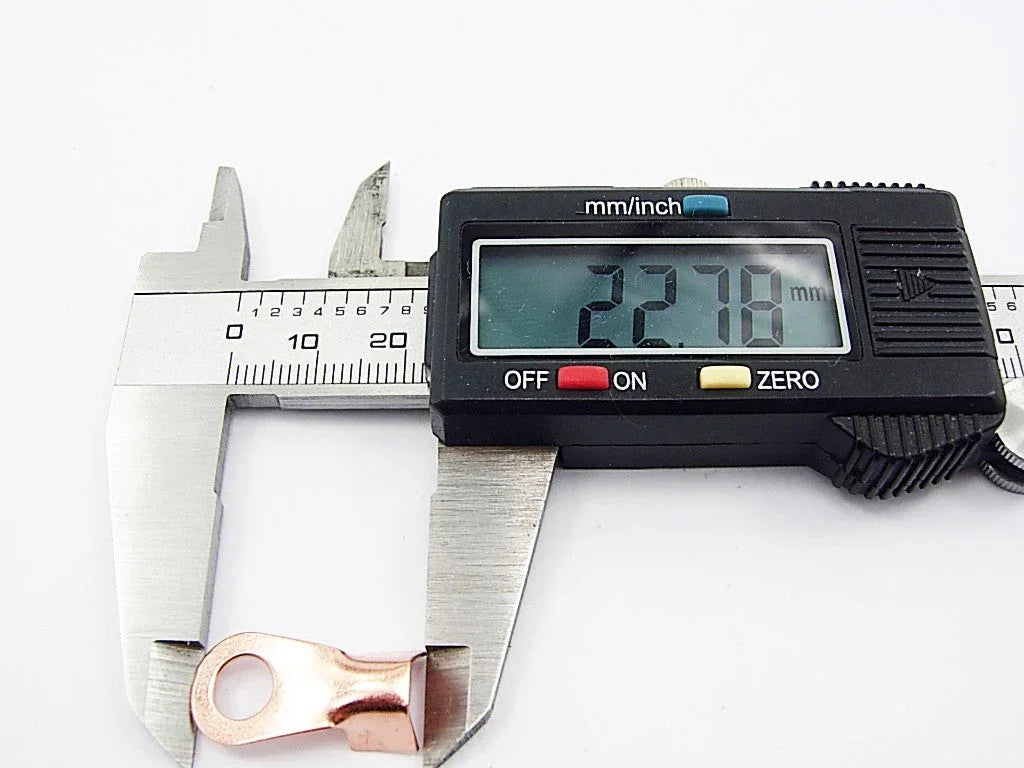 Metal battery connector plug pieces from ChinesePartsUSA, showcasing 10 durable connectors for reliable electrical connections.