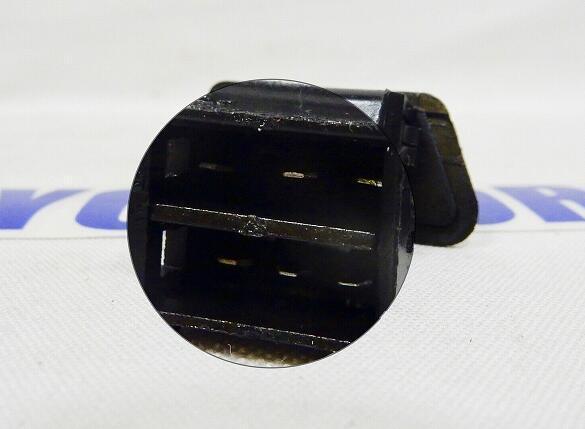 Black electrical connector for motorcycle, ATV, or UTV parts with visible terminals and clip