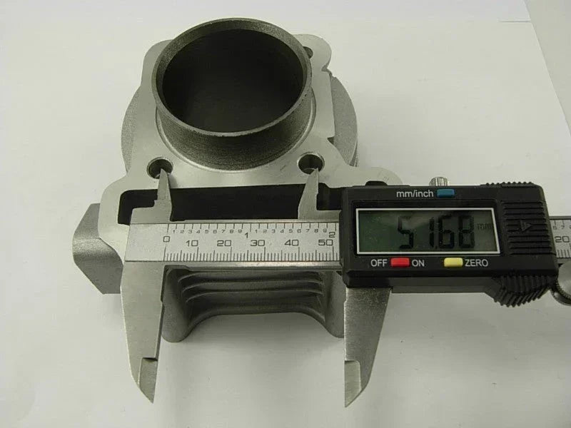 QMB139 big bore cylinder engine kit measured with digital caliper showing 51.68mm