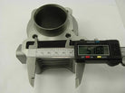 Digital caliper measuring 51.68 mm diameter on a silver metal engine cylinder part
