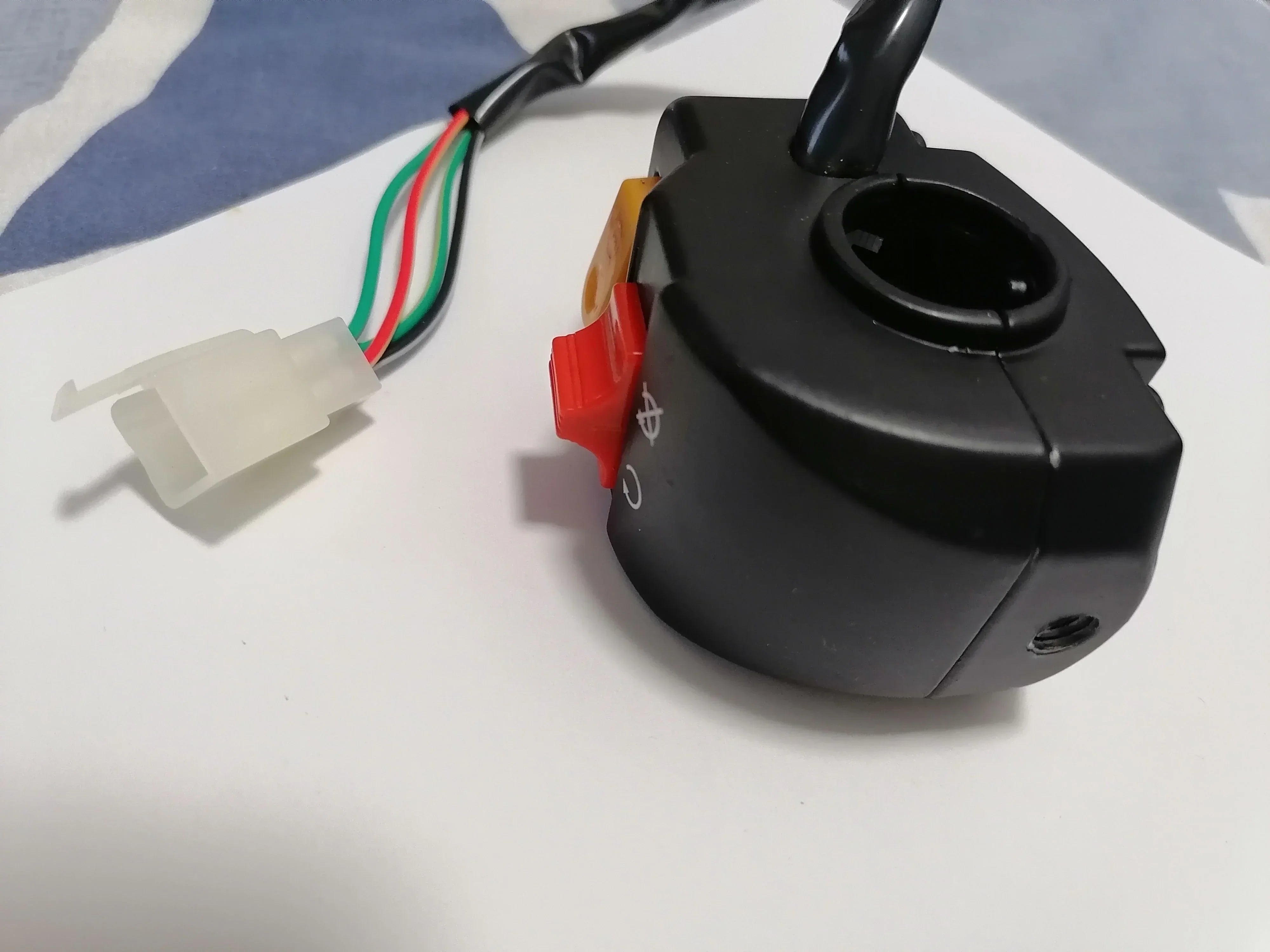 Right side start and kill switch for motorcycle by ChinesePartsUSA, featuring a durable black plastic housing and control buttons.