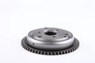 Metal automotive gear sprocket with circular holes and toothed edge on white background