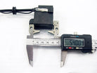 ChinesePartsUSA 47cc 49cc ignition coil for 2-stroke pocket bike mini moto, shown on a small motorcycle engine component.