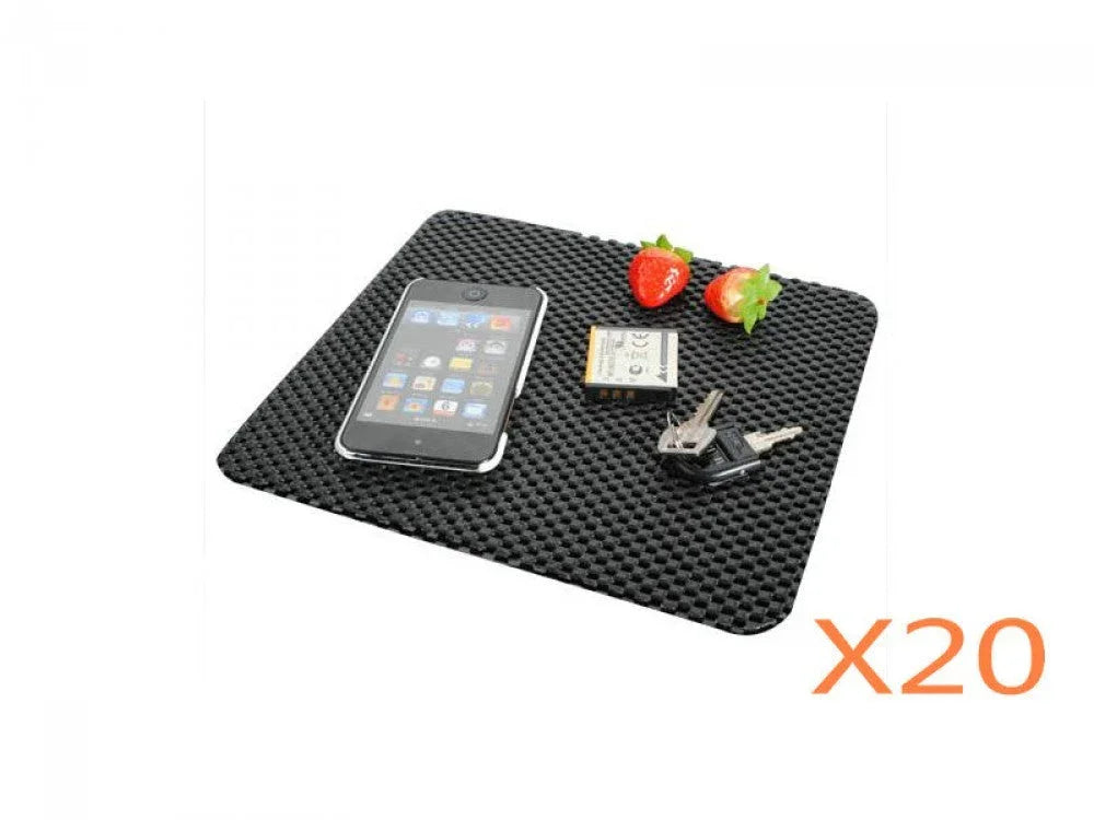 Black car dashboard anti-slip mat holding a phone, keys, battery, and strawberries, 20 pack