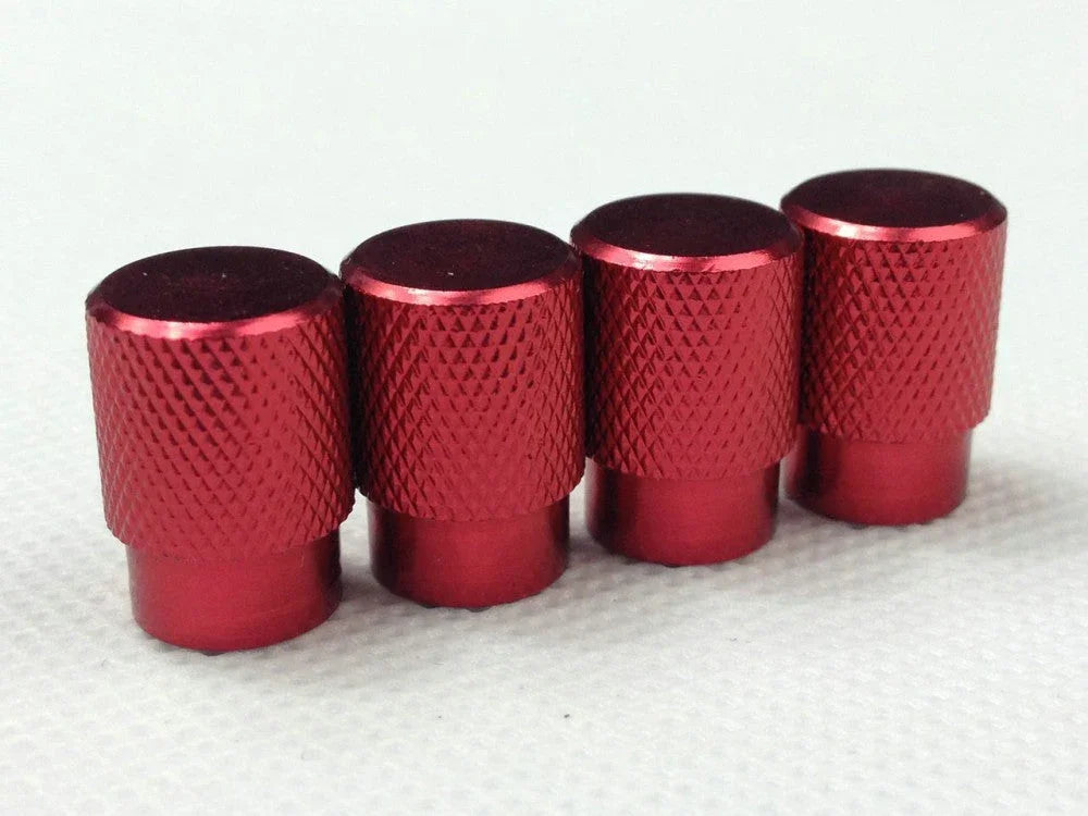 Set of 4 red aluminum tire air valve stem caps for motorcycles, cars, or bikes