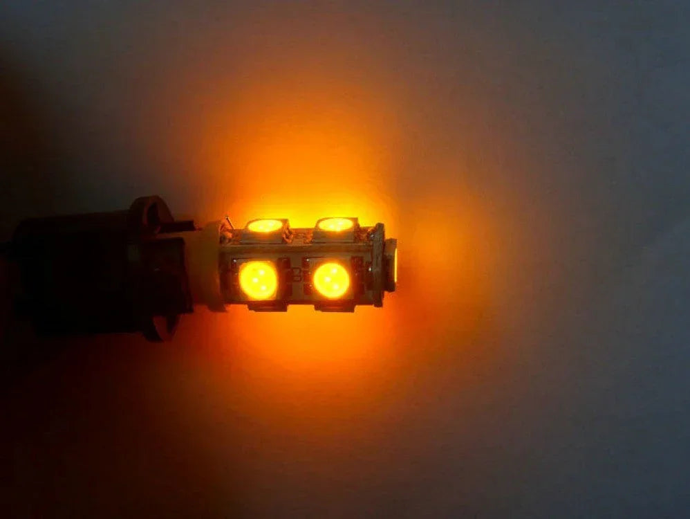 Yellow 5050 LED bulb from ChinesePartsUSA, 12V universal accessory, showing the bright yellow LED light and bulb design.
