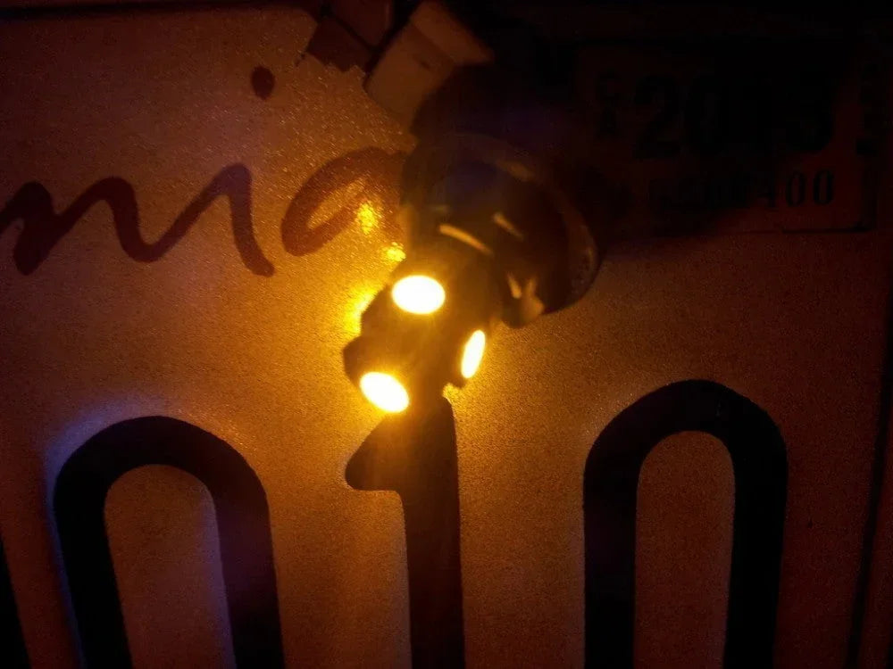 Yellow 5050 LED bulb from ChinesePartsUSA, 12V universal accessory, showcasing the bright yellow LED light.