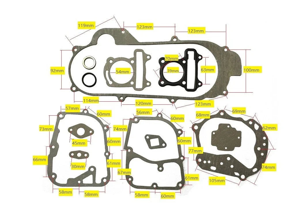 Set of gray engine gaskets with yellow measurement labels showing various dimensions on white background