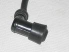 260 CC coil from unknown brand, showing close-up of the metal spiral with detailed wiring and connection points.