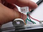 Speedometer assembly for GY6 50cc and 150cc scooters, featuring a speed measurement dial and mounting components.