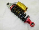 265mm air shock absorber for dirt bikes, vendor-unknown dirt bike parts with a durable coil spring and metal frame.