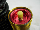 265mm air shock absorber for dirt bikes, durable suspension component designed for off-road riding and shock absorption.
