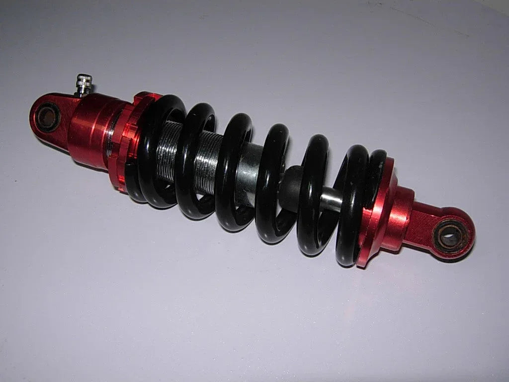 26cm rear shock absorber for dirt bikes, durable suspension part suitable for off-road motorcycle riding.