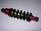 26cm rear shock absorber for dirt bikes, durable suspension part from vendor-unknown with metal and hydraulic components.