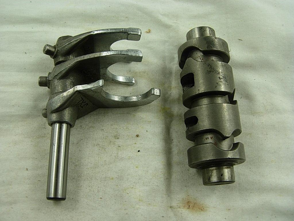 Shift cam assembly for CG150, 200cc, 250cc dirt bikes, shown with metal components and mounting points.